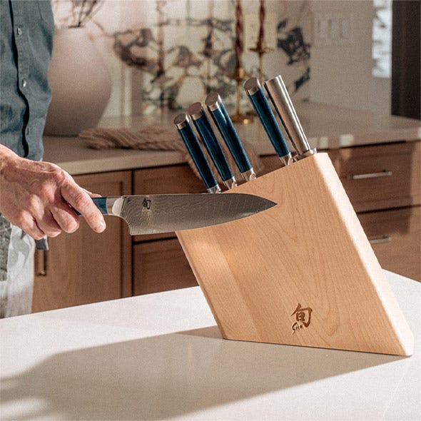 Shun knife block set displayed on a kitchen counter.