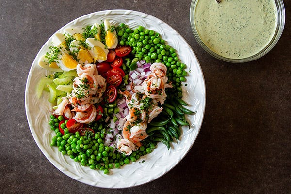 Chopped Salad in a bowl with dressing