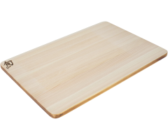Medium Hinoki board with urushi edge angled view showing urushi edge