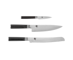The silo images of the Classic Paring Knife, Classic Chef's Knife, and Classic Bread Knife - the three knives that make up this set.