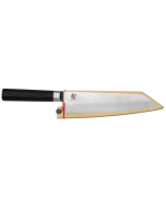 Dual Core Kiritsuke with sliced cabbage on dark cutting board