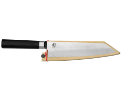 Dual Core Kiritsuke with sliced cabbage on dark cutting board